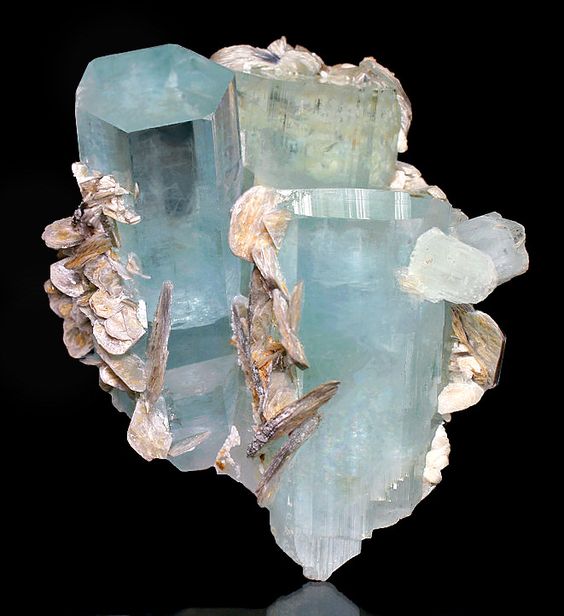 Aquamarine crystals and Muscovite